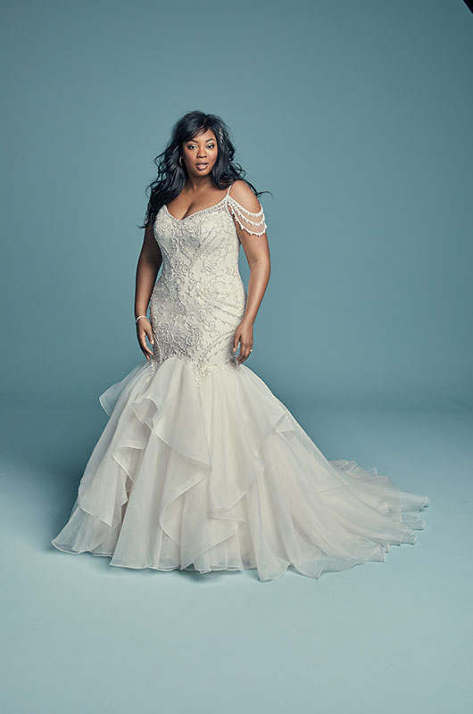 Liris Crosse in a bridal-inspired editorial portrait